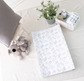 The Gilded Bird Wedge Changing Mat - Lovely Leaves Grey